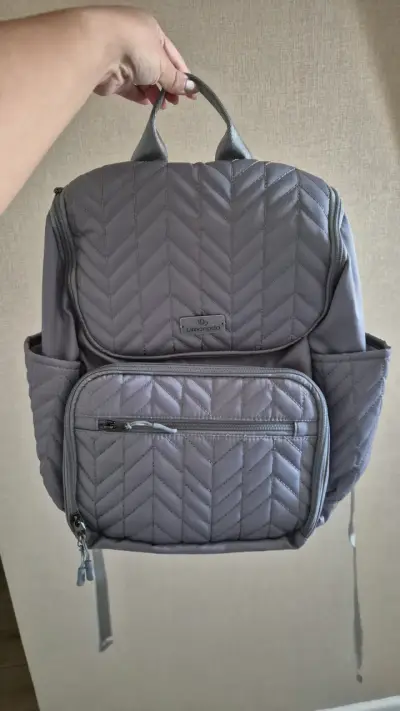 Mochila gris pañalera - miniatura 1