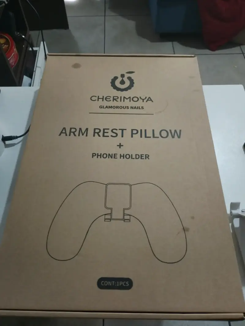 Cojín para brazo con soporte de celular - 1