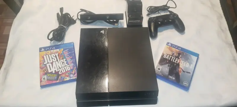 Consola PS4 con accesorios y juegos - 1