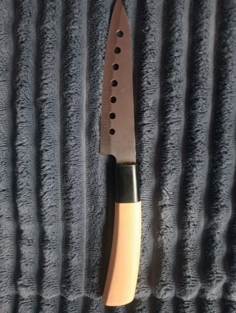 Cuchillo de cocina perforado