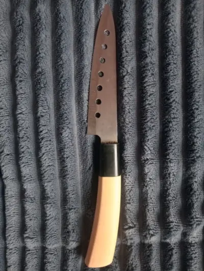 Cuchillo multiusos con agujeros - miniatura 1