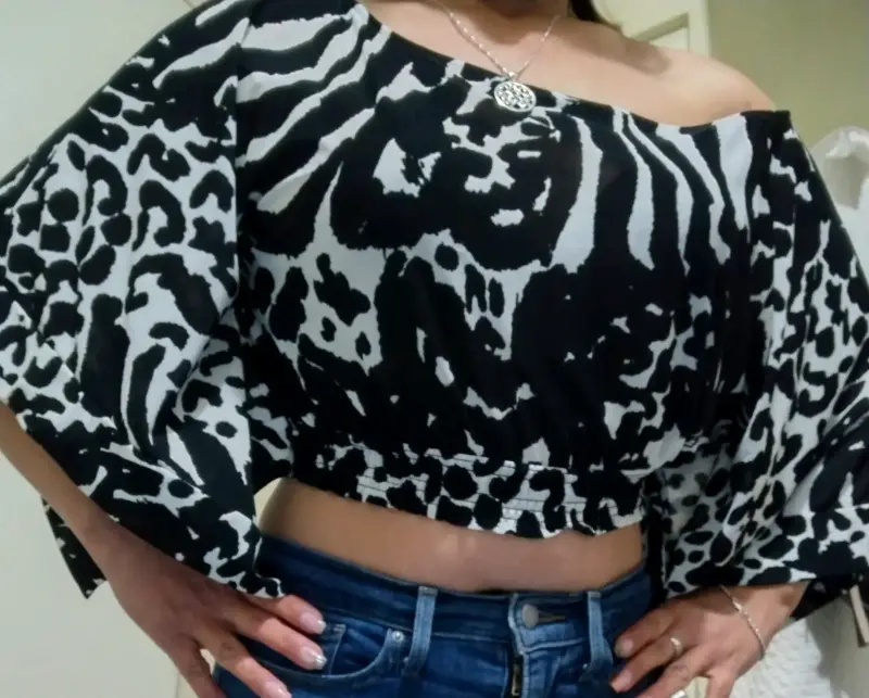 Blusa off-shoulder estampado animal - 1