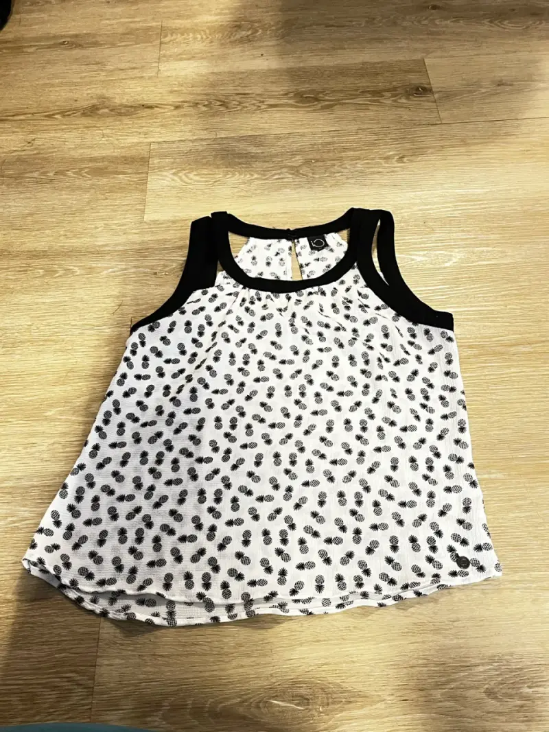 Polera sin mangas estampada - 1