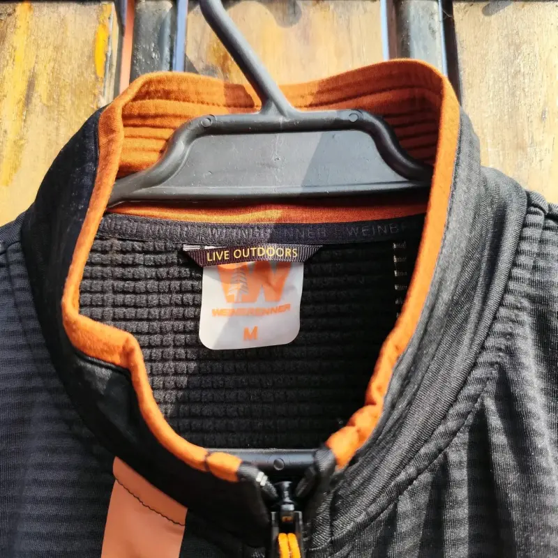 Chaqueta deportiva Warmfill negro y naranja - 2