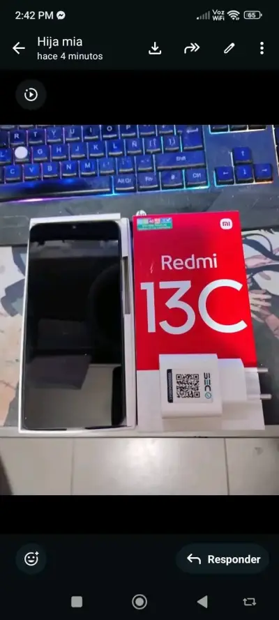 Teléfono Redmi 13C con cargador - miniatura 1