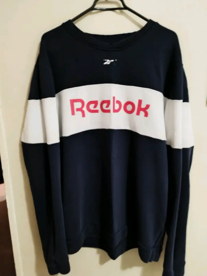 Chaqueta deportiva azul y blanca - 2