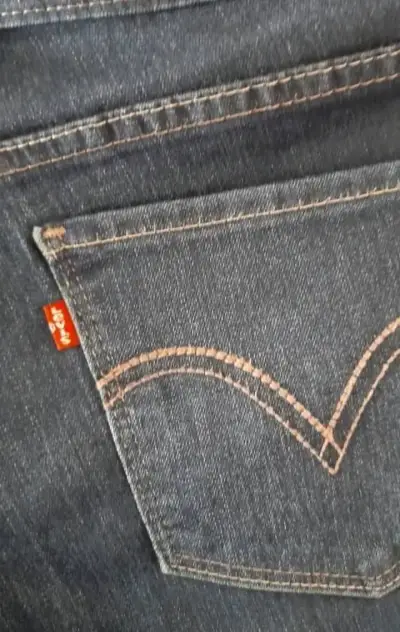 Jeans oscuros para mujer - miniatura 3