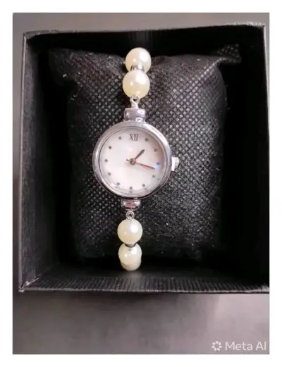 Reloj metálico elegante para mujer - miniatura 6