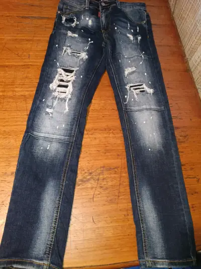 Jeans azul efecto desgastado - miniatura 3