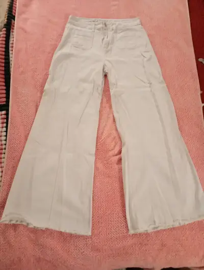 Pantalones blancos anchos - miniatura 1