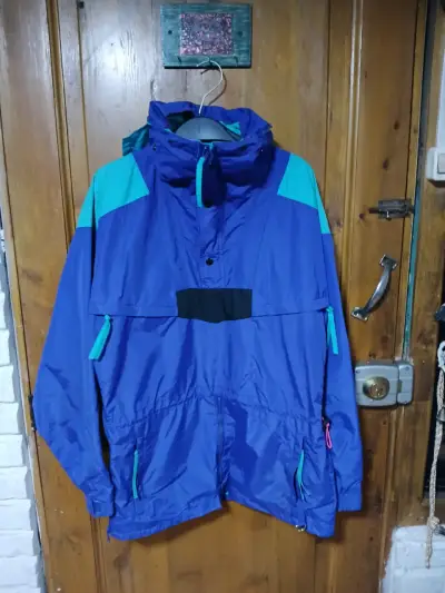 Anorak azul con capucha - miniatura 1
