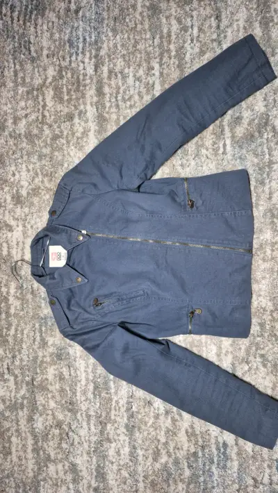 Chaqueta azul con zipper de estilo casual - miniatura 1