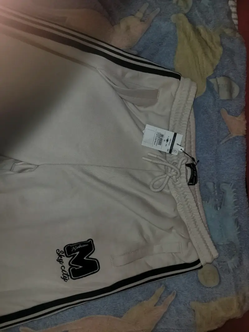 Pantalones de buzo beige con franjas - 1