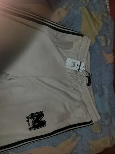 Pantalones de buzo beige con franjas - miniatura 1