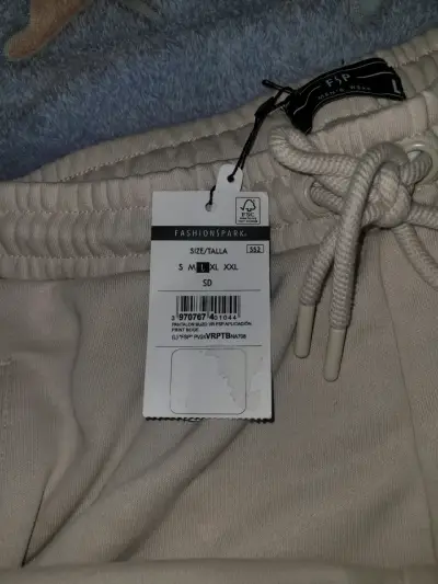 Pantalones de buzo beige con franjas - miniatura 2
