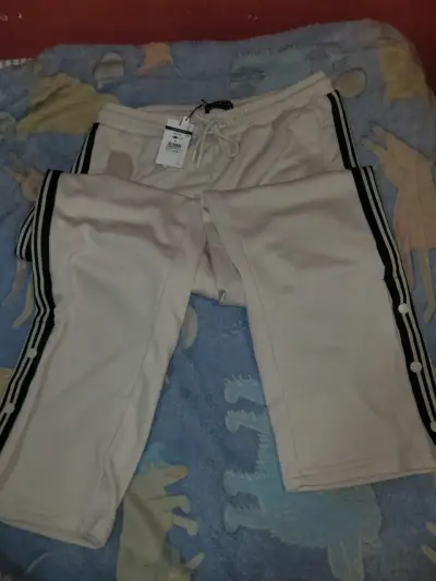 Pantalones de buzo beige con franjas - miniatura 3