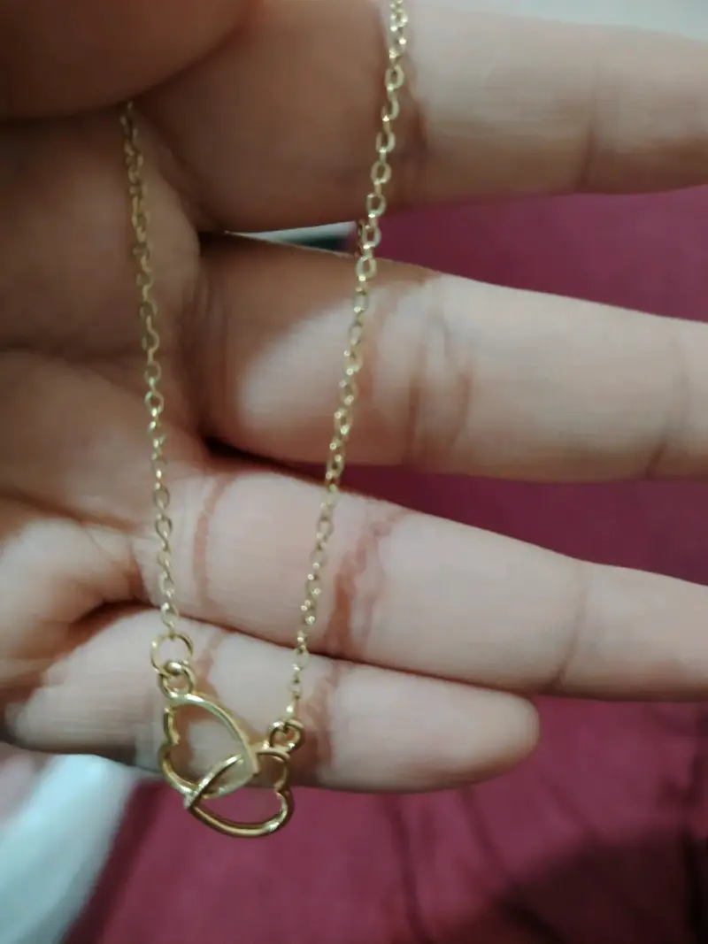 Collar de mariposa dorado