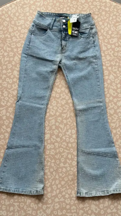 Jeans acampanados con tachas - miniatura 1