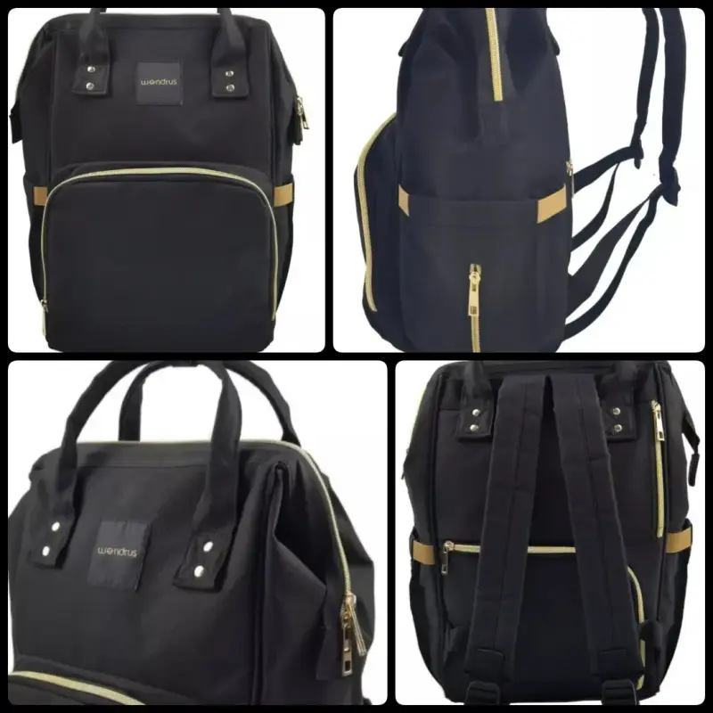 Mochila pañalera negra con cierre dorado - 1