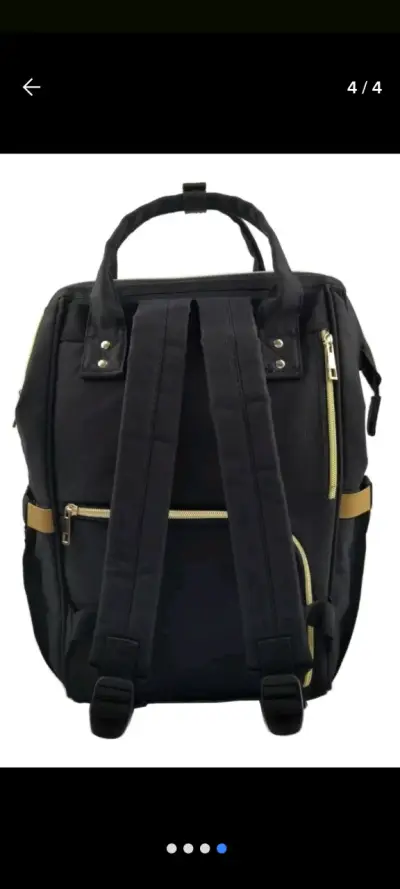 Mochila pañalera negra con cierre dorado - miniatura 2
