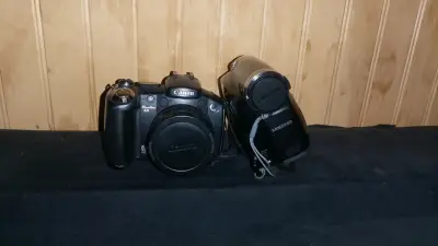 Cámara Canon y videocámara Samsung - miniatura 1