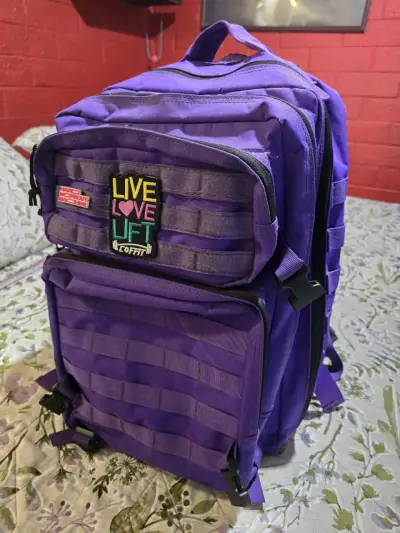Mochila morada deportiva - miniatura 1