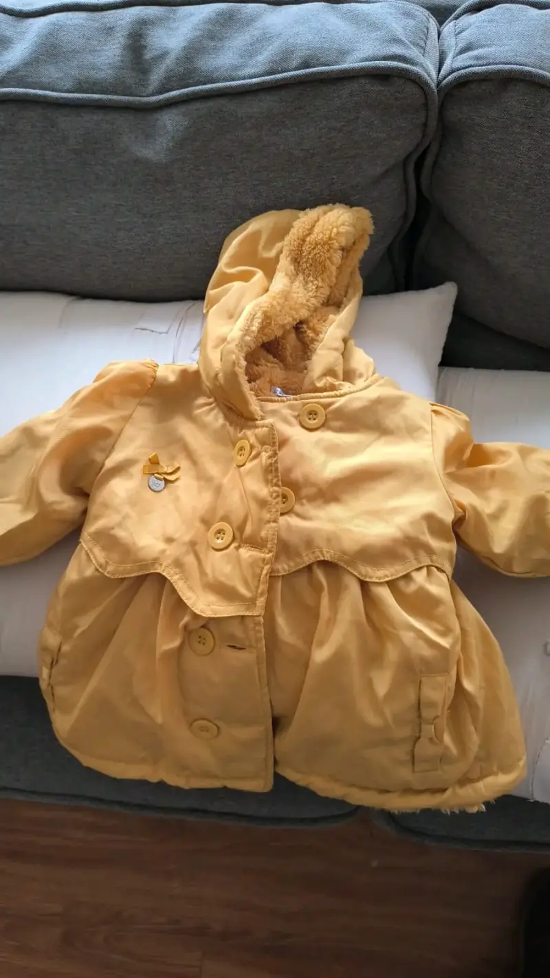 parka amarilla para bebé 6M
