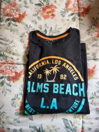 Polera negro Palms Beach talla M y las otras S - miniatura 1