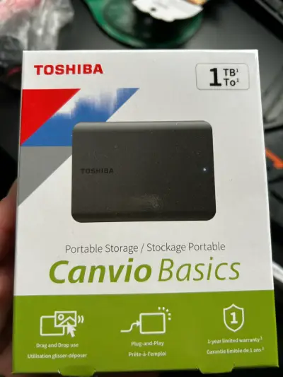 Disco duro portátil Toshiba 1TB - miniatura 1
