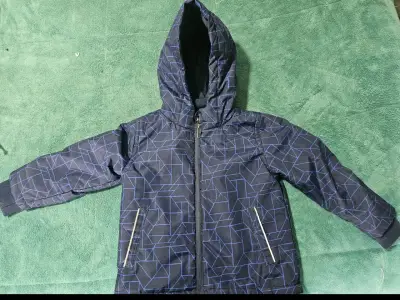 Chaqueta impermeable azul con capucha - miniatura 1