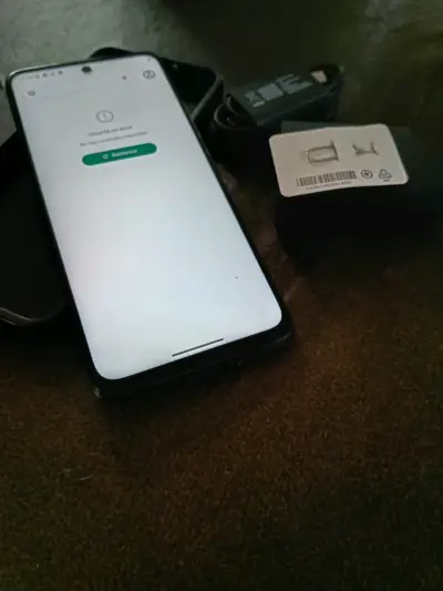 Smartphone Motorola con accesorios - miniatura 2