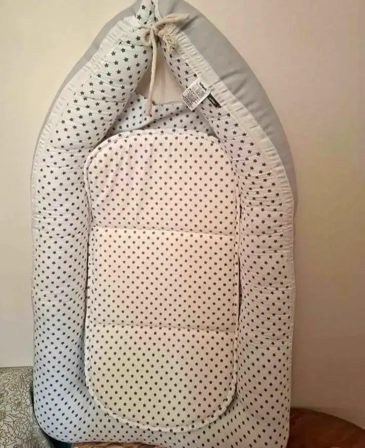 Nido de bebé con estrellas