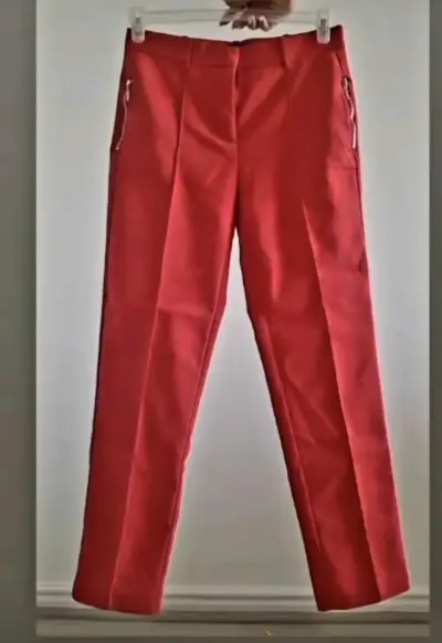 Pantalones rojos con cierre - miniatura 1