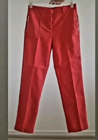 Pantalones rojos con cierre - miniatura 2