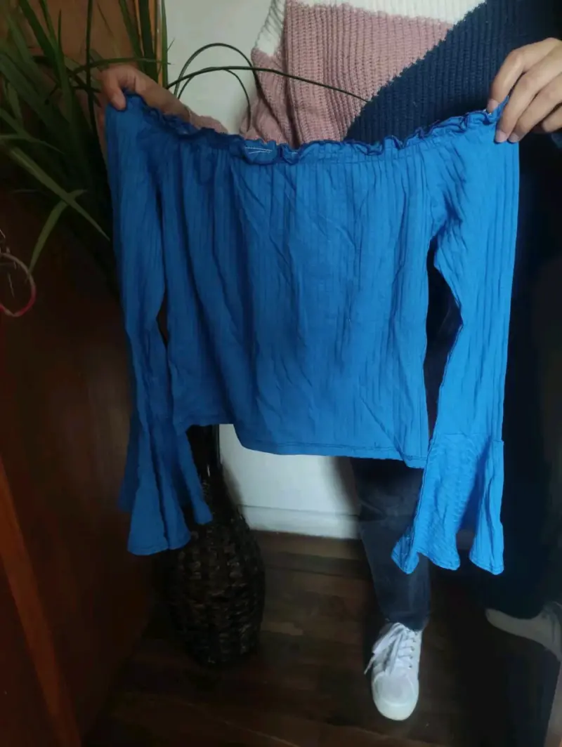 Fardo de prendas nuevas y usadas como nuevas - 1