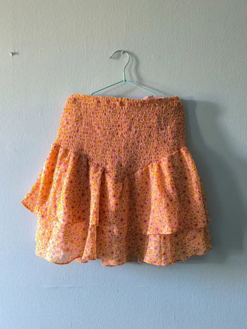 Falda corta floreada naranja