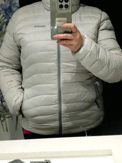 Chaqueta puffer gris Marmot - miniatura 1
