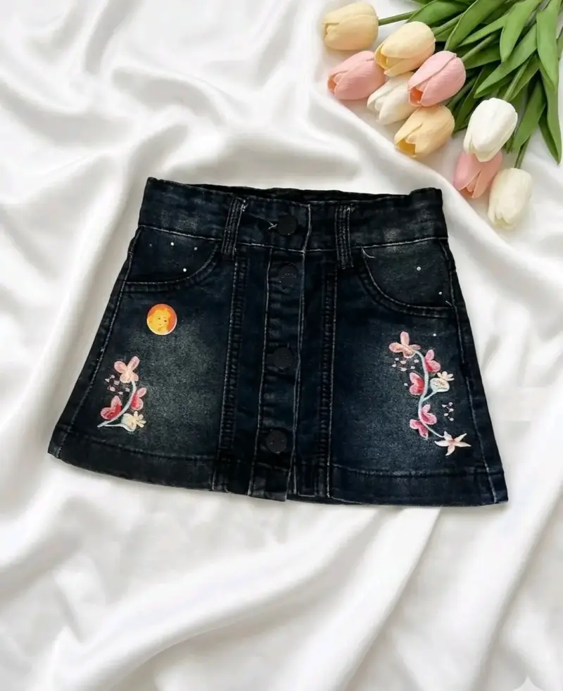 Falda denim bordada niña