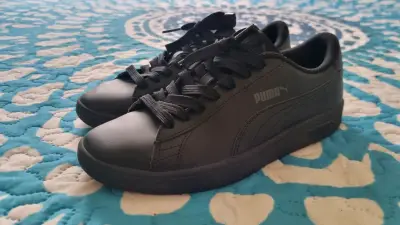 Zapatillas negras Puma - miniatura 1