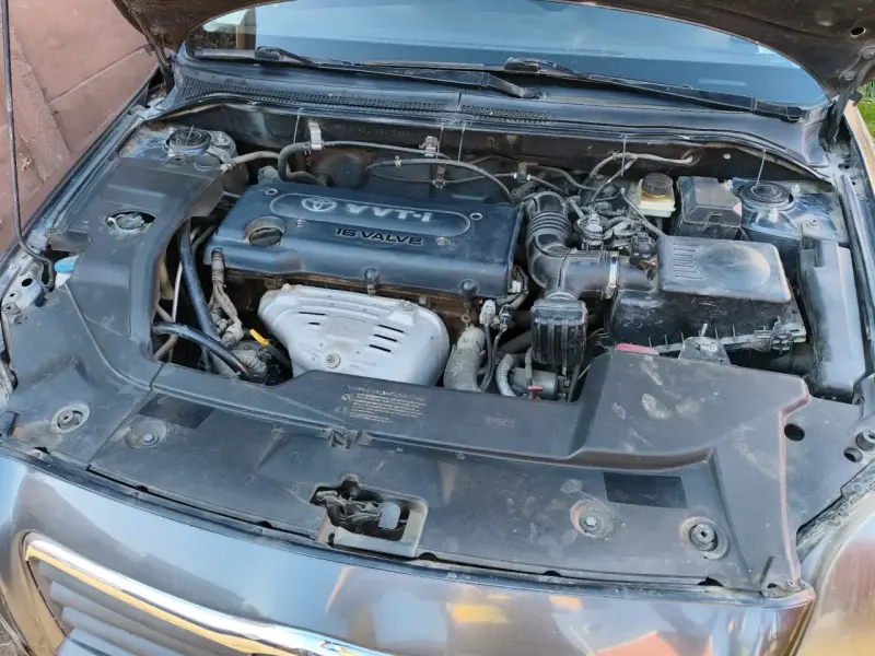 Auto Toyota avensis sedán gris 2006 - 5