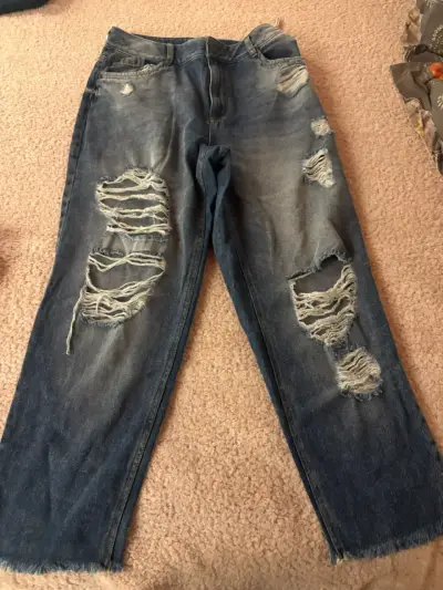 Jeans desgastados azul con roturas - miniatura 1