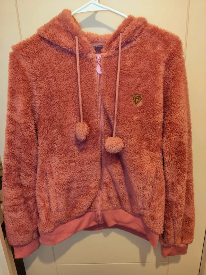 Chaqueta peluda rosada