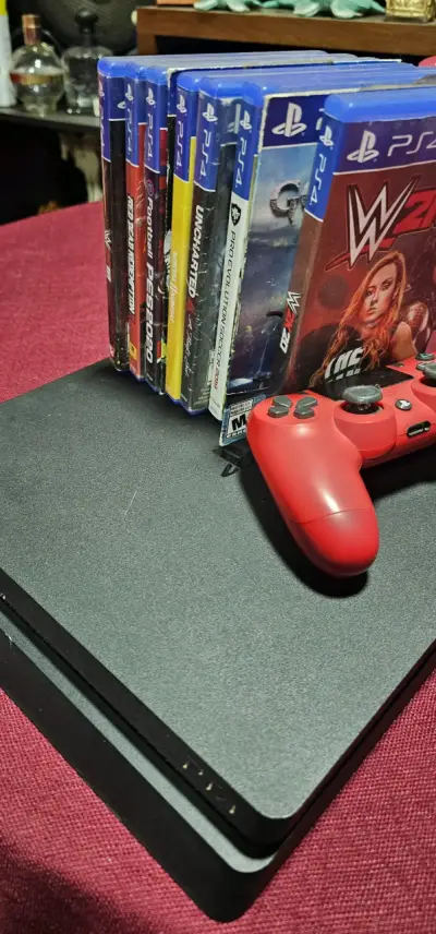 Consola PlayStation negra con control - miniatura 4