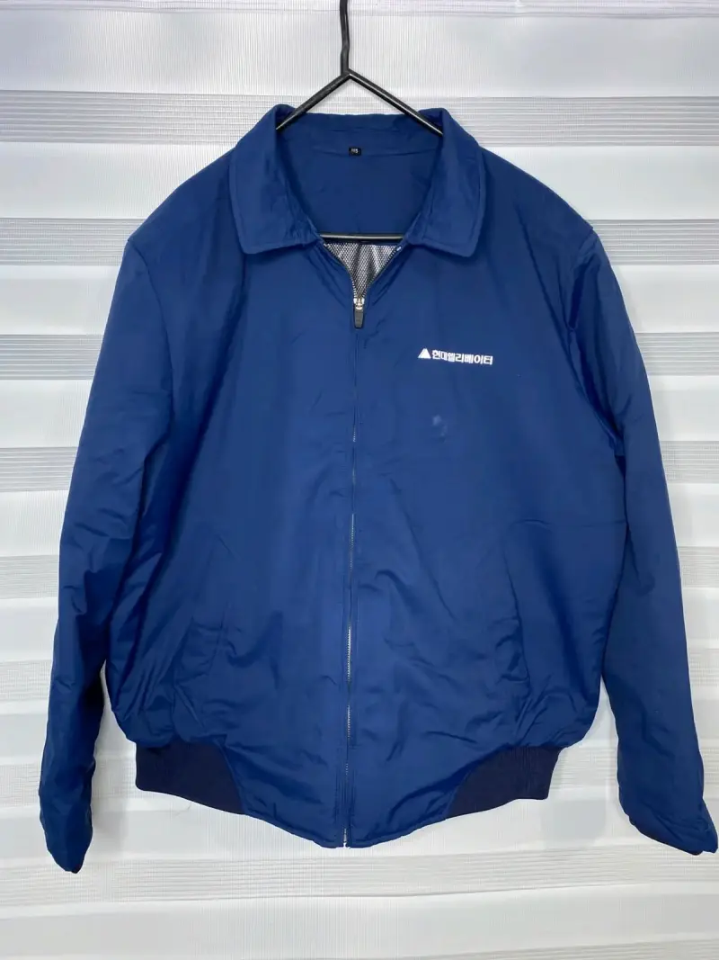 Chaqueta azul con logo - 1