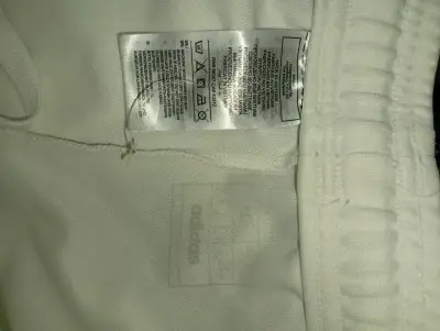 Pantalones deportivos blancos - miniatura 2