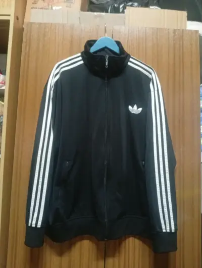 Chaqueta deportiva negra Adidas - miniatura 1