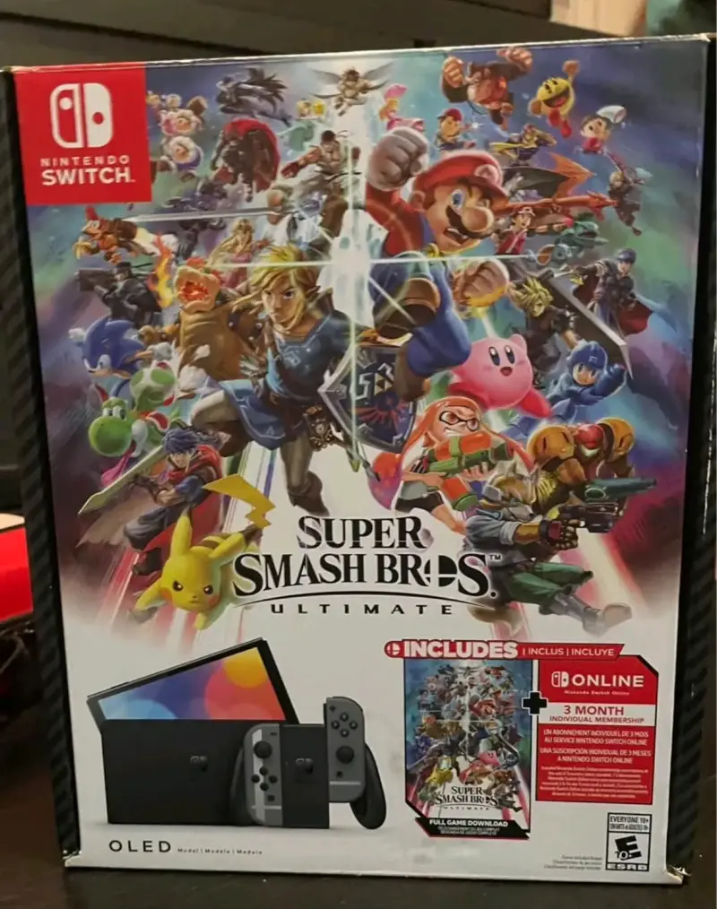 Nintendo Switch OLED con Super Smash Bros - 1
