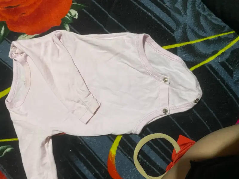 Body rosado para bebé