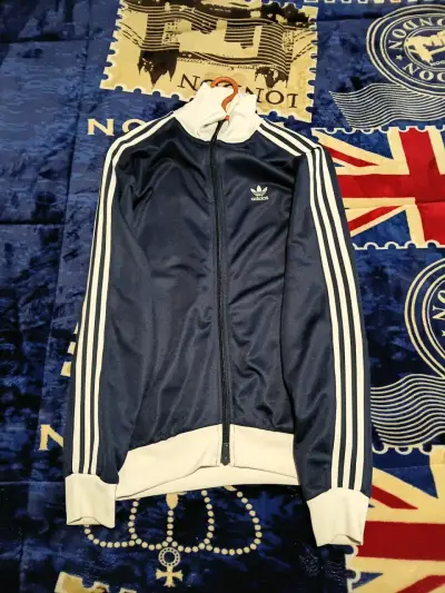 Chaqueta deportiva azul con logo - miniatura 1