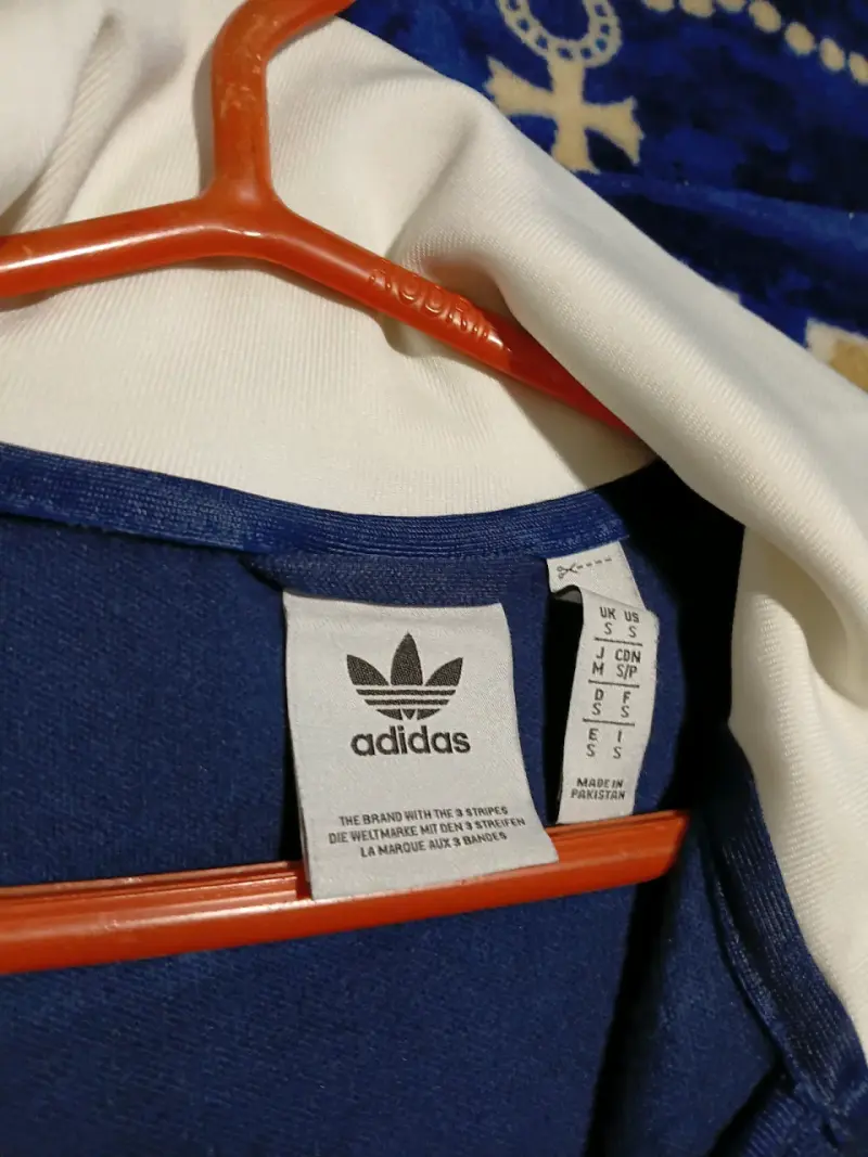 Chaqueta deportiva azul con logo - 4